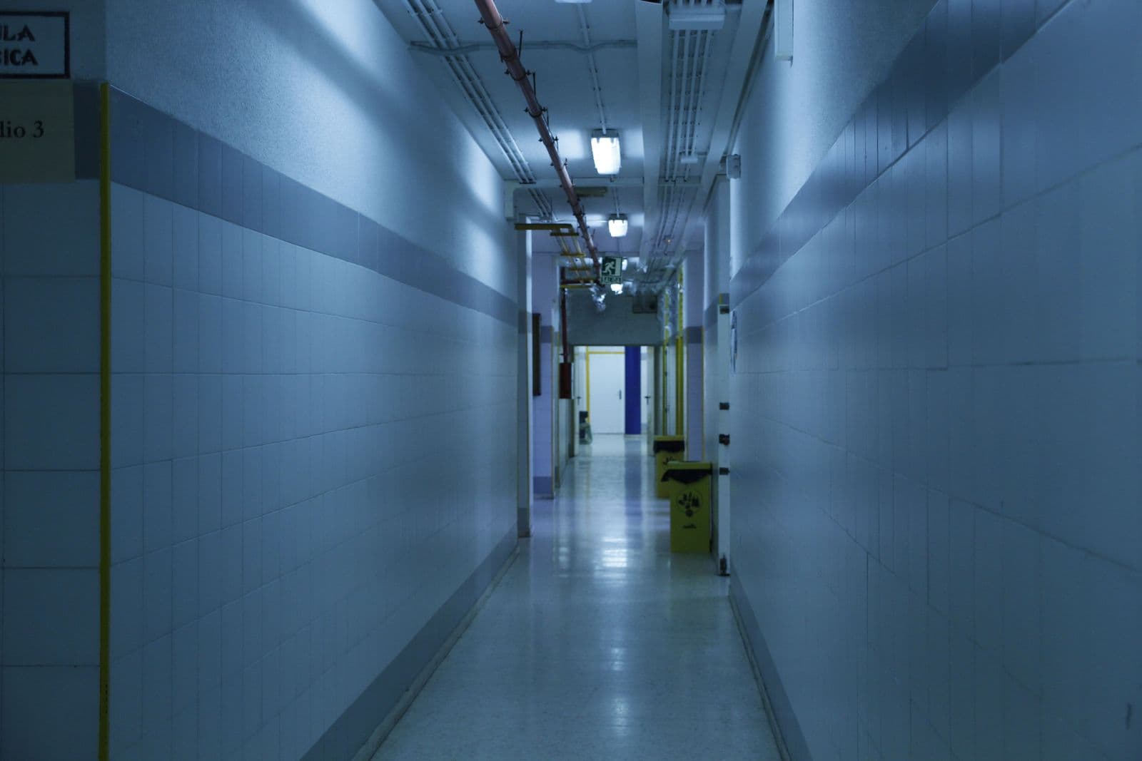 Bright hospital hallway interior leading to TruLab patient care rooms