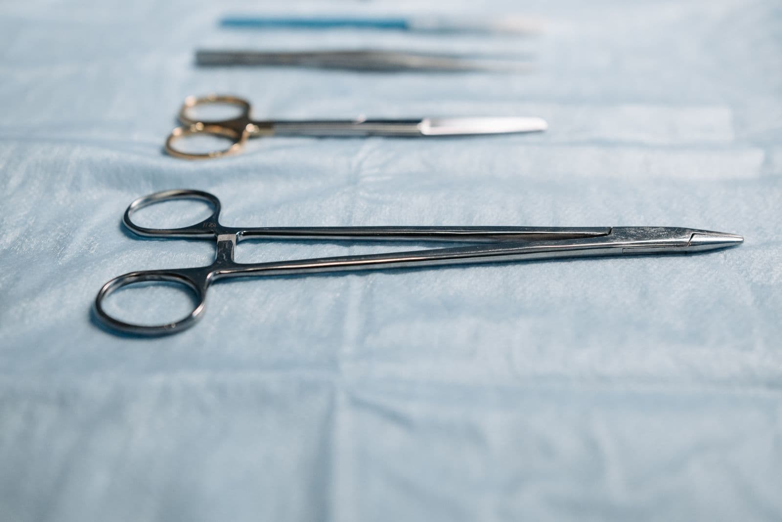 Macro shot of precision medical instruments arranged for testing